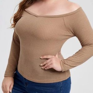 Slight off the shoulders long sleeve.